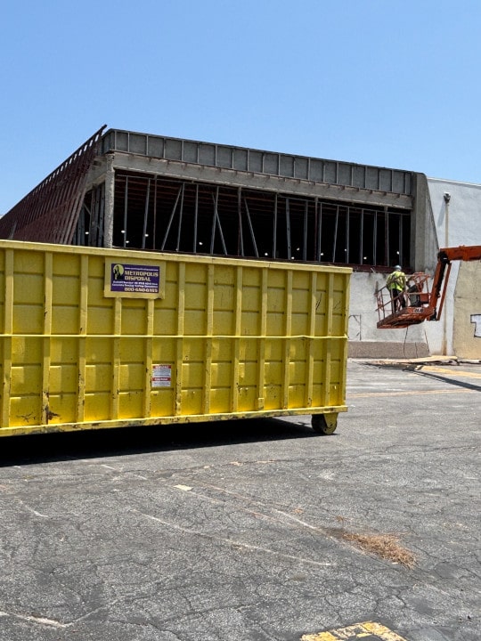 roll out dumpster during demolition of erewhon store in glendale ca