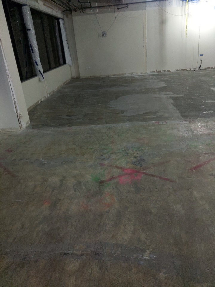 finished concrete floor after selective demolition at prudential retirement services building