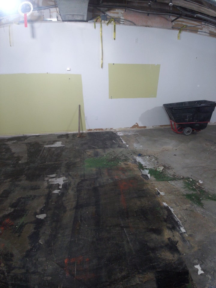 concrete floor scraped during selective demolition at prudential retirement services building