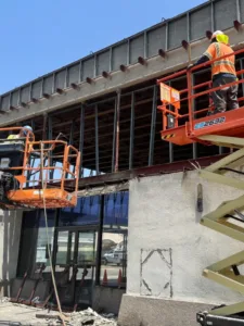 two scissor lifts during demolition of erewhon store in glendale ca