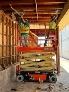 scissor lift during demolition of erewhon store in glendale ca