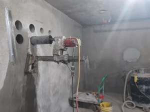imt residential concrete coring with core drills attached to wall - pic 2