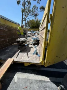 tile removal project at irmas campus school -haul away view 2