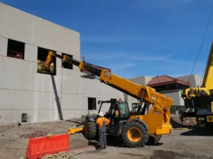 reach forklift removing panel for takeda pharmaceuticals demolition project - pic 1
