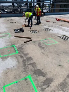 crews removing concrete from robertson deck at northrop grumman