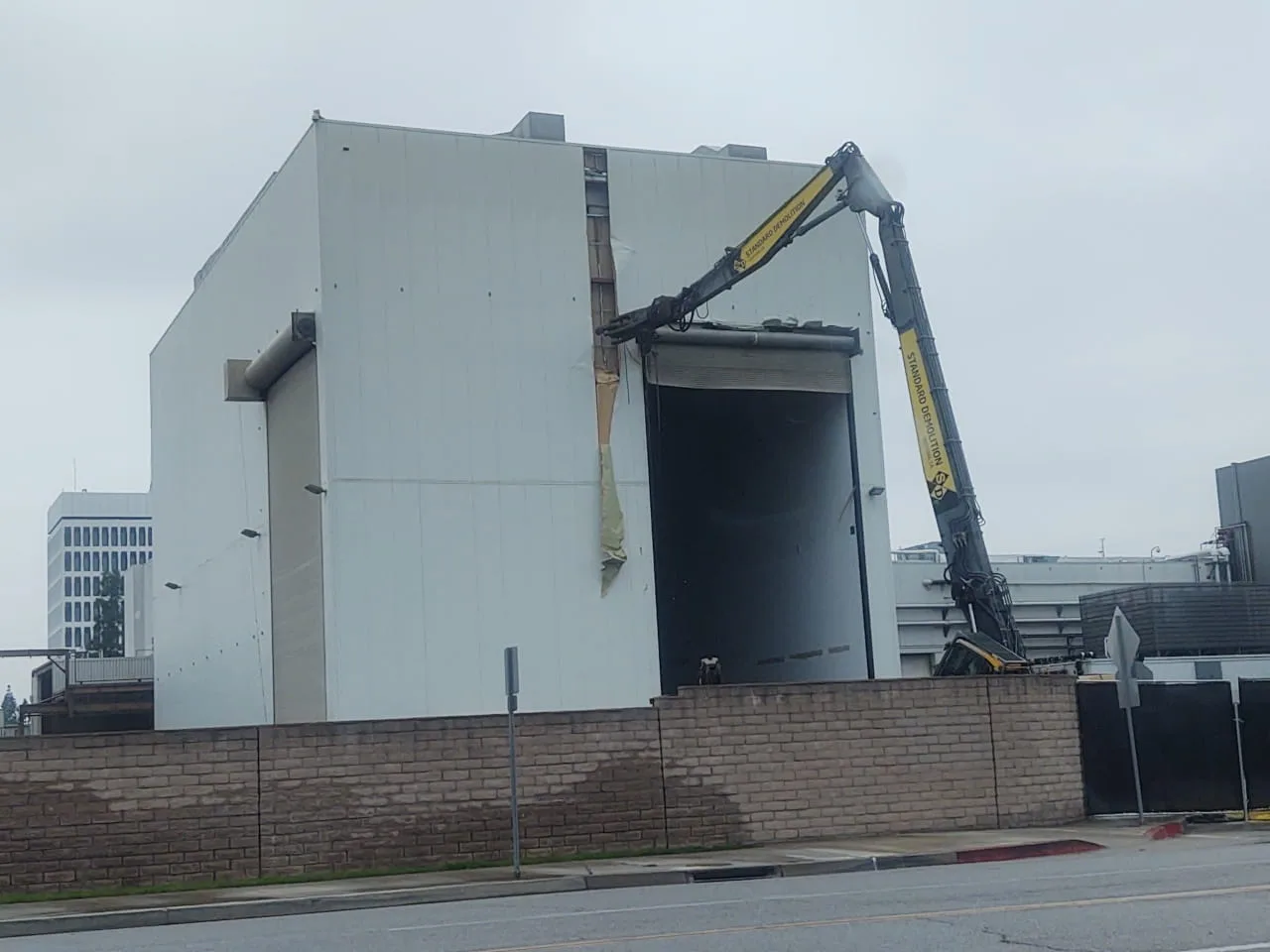 excavator begins demolition of high-bay building at northrop grumman