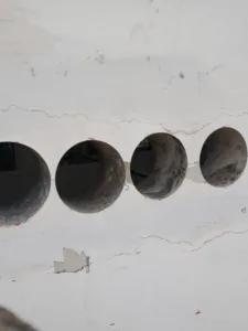 4 wall holes created by concrete core drilling at Pyramid Labs in Costa Mesa