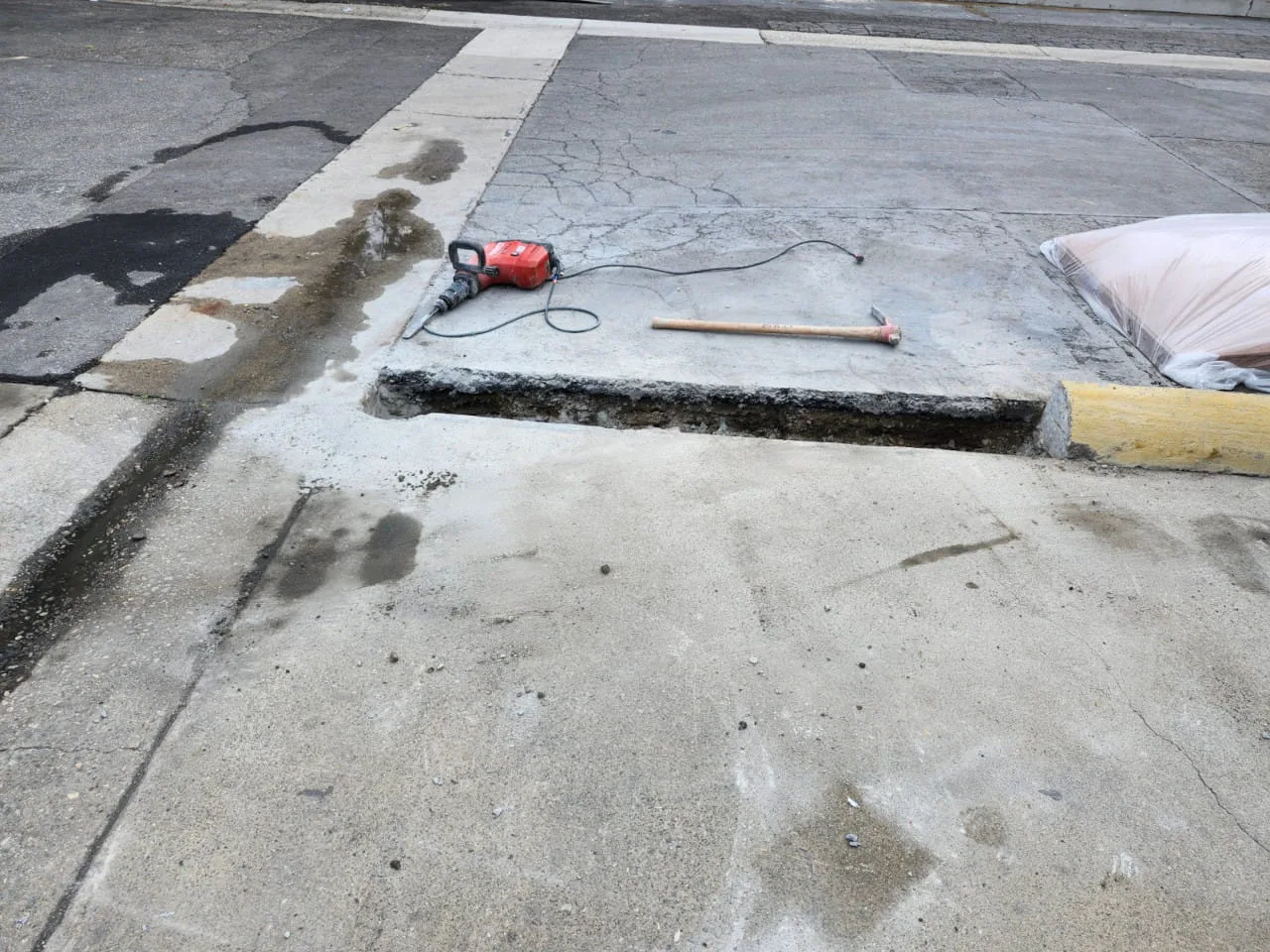 hand sawng concrete curb at Pyramid Labs in Costa Mesa