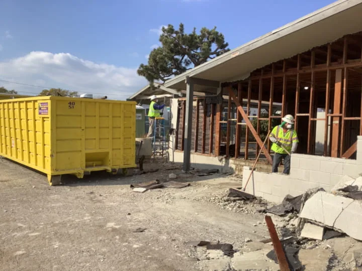 debris dumpster on site at residential care facility in azusa, ca